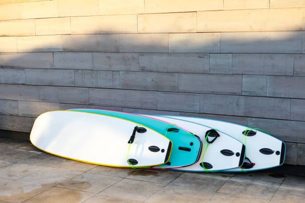 istock surfboards on the ground at sunset 1347188875