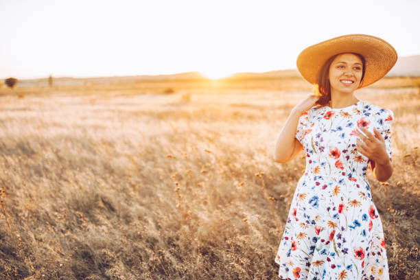 istock Female freedom on the golden meadow 1347190106