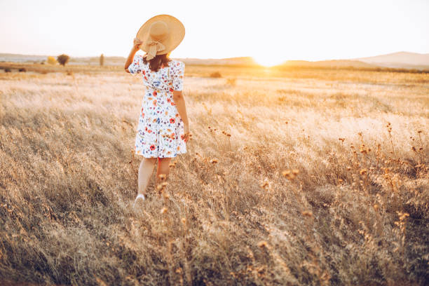 istock Female freedom on the golden meadow 1347190726