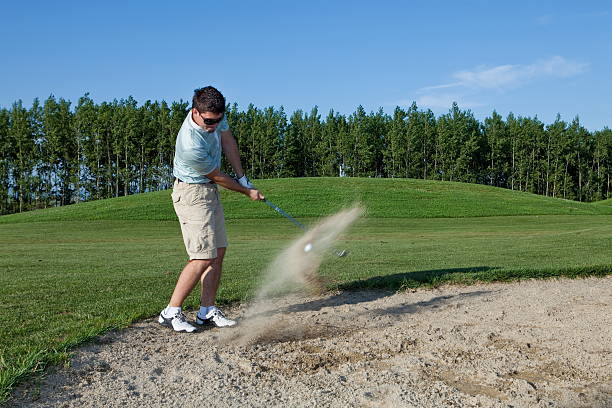 istock Sand trap shot...ball in motion 134719458