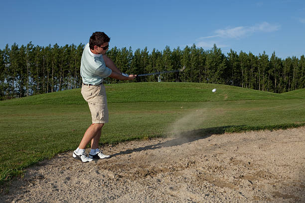 istock Sand trap shot...ball in motion 134719459