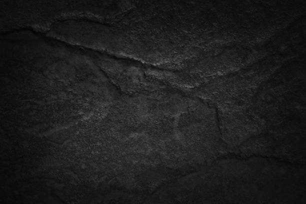 istock Dark gray black slate stone wall texture background in natural pattern for decorative interior and exterior. 1347196186