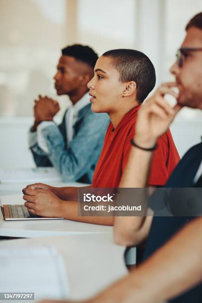 Teenage Students Paying Attention To Lecture Stock Photo - Download Image Now - Lecture Hall, University Student, Learning