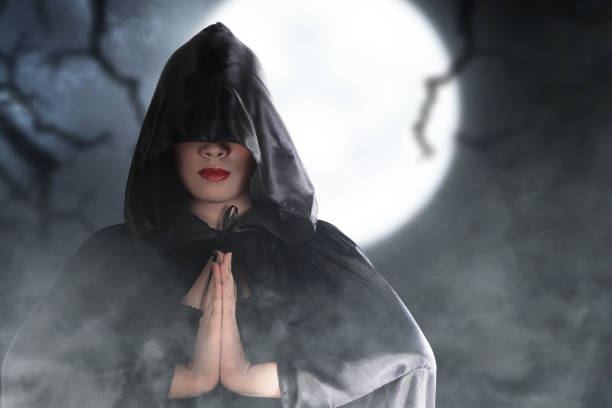 istock Asian witch woman with a cloak standing 1347197648