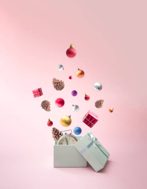 A gift box from which New Year's decorations fall out like an explosion.