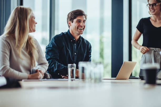 istock Business people smiling after a productive meeting 1347197677