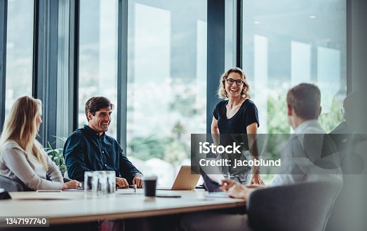 istock Business people having casual discussion during meeting 1347197740