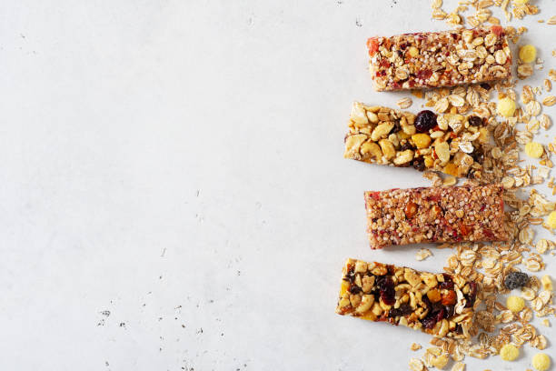 istock Nuts and oats energy mix bars on white background 1347204076