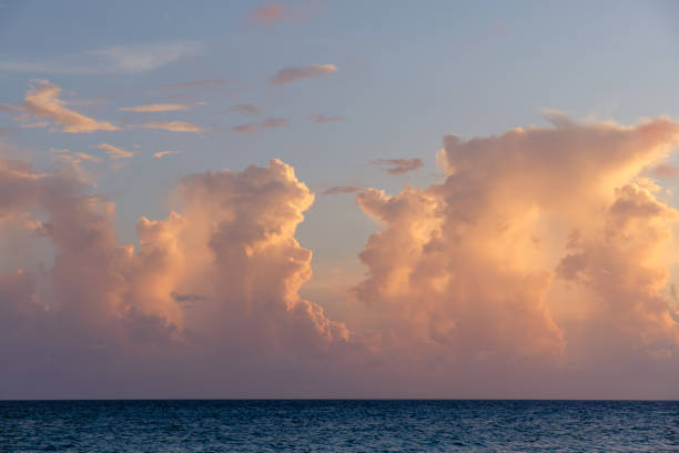 istock Beautiful colored cloudy evening sky. Sky with clouds at sunset. Seascape 1347204425