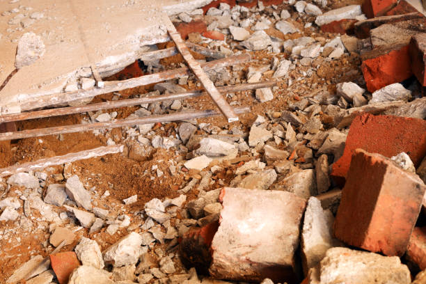 istock Dismantling, disassembling the floor. Smashed concrete and bricks floor. Destroying concrete surface. Renovation, old building, construction. 1347205229