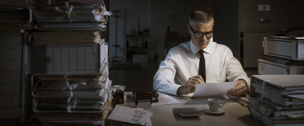 istock Businessman working late at night 1347205460
