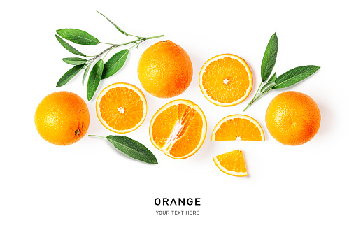 Stock photo showing citrus fruit wedges on white background, modern minimalist photo of sliced Seville orange citrus fruit showing seeds / pips and rind around edge, healthy eating concept photo for vitamin C and fruit juice.