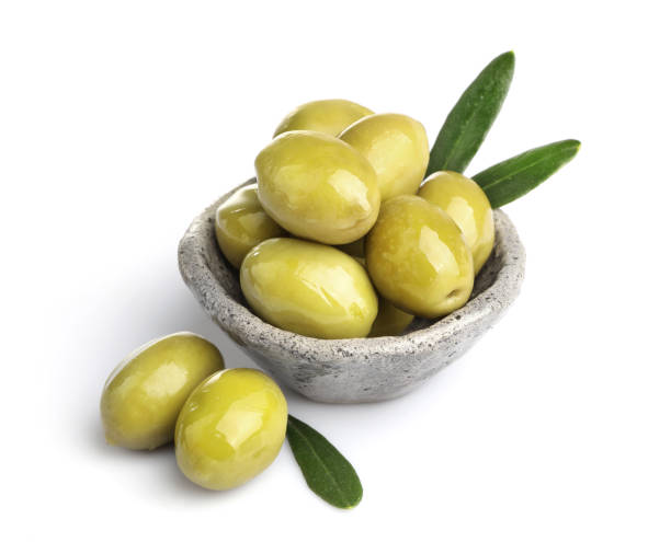 istock Delicious green olives isolated on white background 1347207936