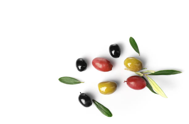 istock Green, red and black olives isolated on white background 1347207951