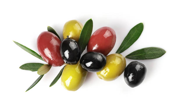 istock Green, red and black olives isolated on white background 1347207956