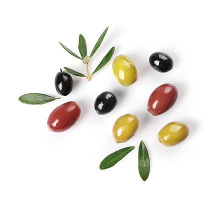 Green, red and black olives isolated on white background. Top view