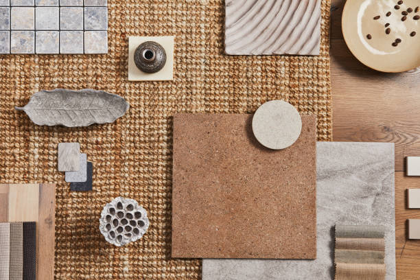 istock Flat lay of creative architect moodboard composition with samples of building, orange textile and natural materials and personal accessories. Top view, template. 1347209902