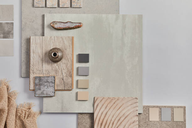 istock Flat lay of creative architect moodboard composition with samples of building, textile and natural materials and personal accessories. Top view, grey background, template. 1347209931