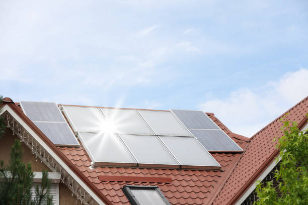 istock House with installed solar panels on roof 1347211322