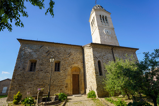 Lesignano de Bagni, Italy - May 30, 2021: Exterior of the old church in Lesignano de Bagni, Parma province, Emilia-Romagna, Italy
