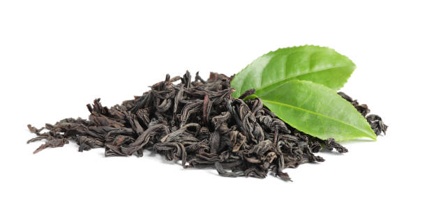 istock Dry and fresh tea leaves isolated on white 1347211847