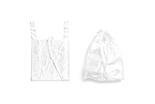 istock Blank white t-shirt plastic bag with handle mockup, top view 1347213274
