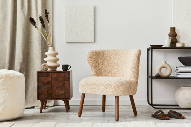 istock Stylish living room interior design composition with mock up structure painting, fluffy armchair, commode and personal accessories. Modern classic style. Template. 1347213600