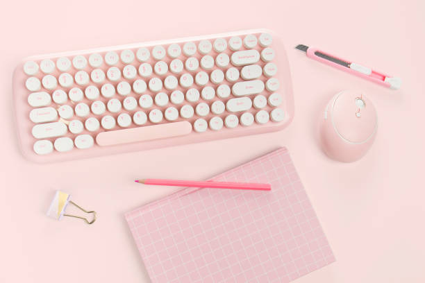 istock flat lay pink book stationery and keyboard 1347214517