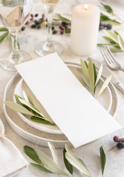 istock Wedding Table place with a card decorated with olive branches 1347216495
