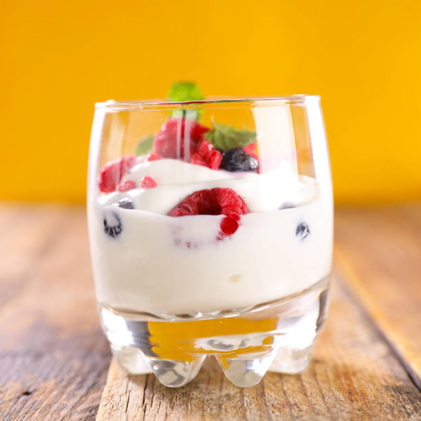 istock glass with yogurt and berries fruits 1347216752