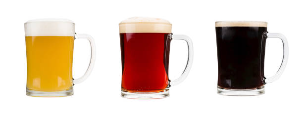 istock Mugs filled with red, dark and blond beer 1347218264