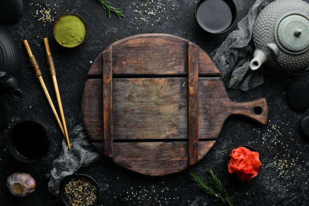 istock Asian cooking background. Spices and herbs on old table. 1347218675
