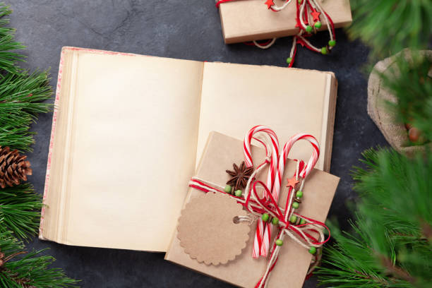 istock Christmas gift box with craft decor and vintage book 1347221841
