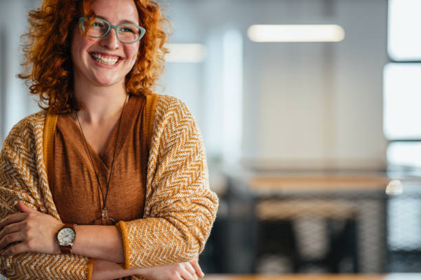 istock Businesswoman posing and smiling at the workplace 1347226190