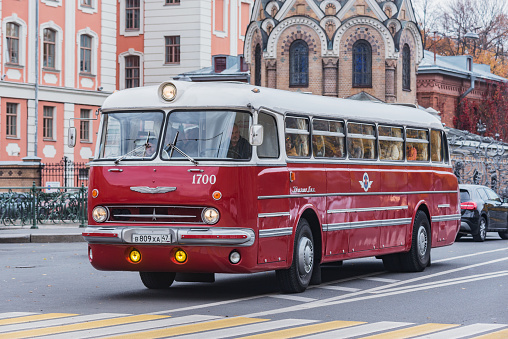 Saint Petersburg, Russia - October 05, 2021: Touristic bus Ikarus Lux in the historical city center street.