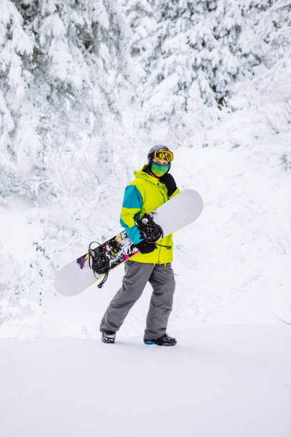 istock man snowboarder in ski equipment 1347229829