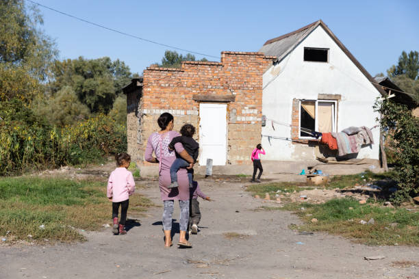 Roma village in Western Ukraine Uzhgorod, Ukraine - Oct. 10, 2021: Roma houses. Gypsy slums on the outskirts of Uzhgorod in a roma village in Western Ukraine. People living in miserable conditions. ukrainian village stock pictures, royalty-free photos & images