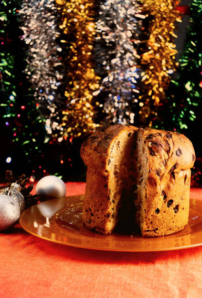 istock Delicious panettone on christmas table wit decorations and advent wreath 1347231675