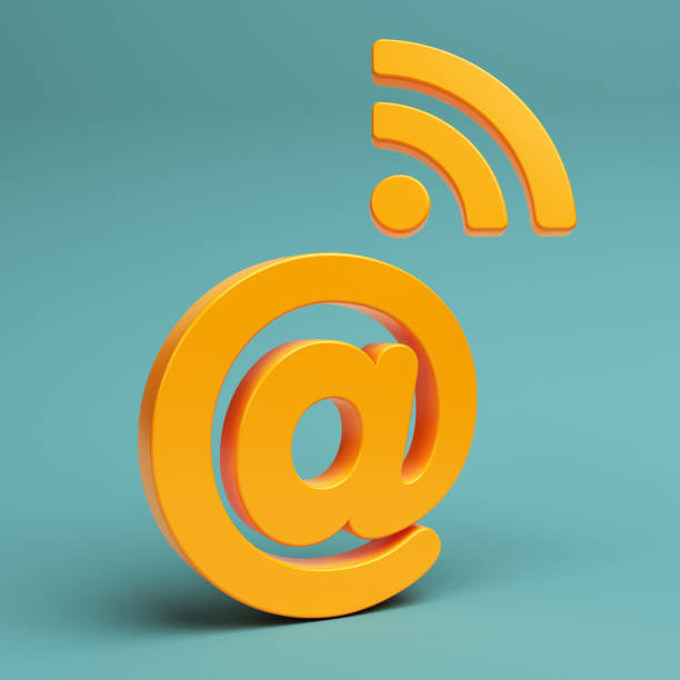 pomarańczowy symbol "at" i ikona wi-fi. - @ zdjęcia i obrazy z banku zdjęć