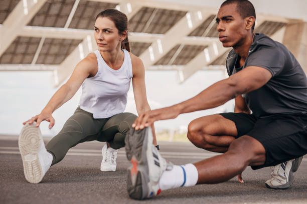 istock Couple exercising on the street 1347236545