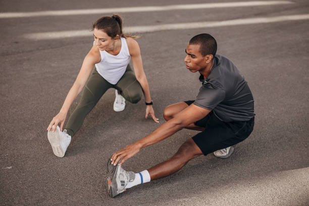 istock Couple exercising on the street 1347236716