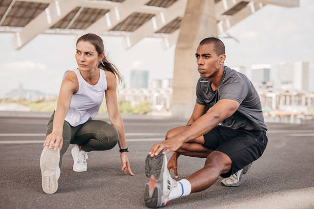 istock Couple exercising on the street 1347236907
