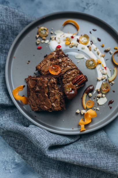 istock Chocolate pie with pican and citrus, served with dessert on christmas 1347239491