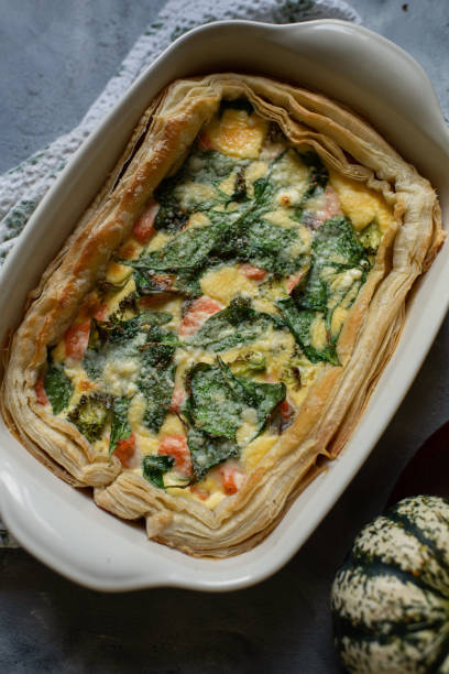 istock Diet pie, on a shortbread crust with broccoli, drenched in cheese sauce 1347239533