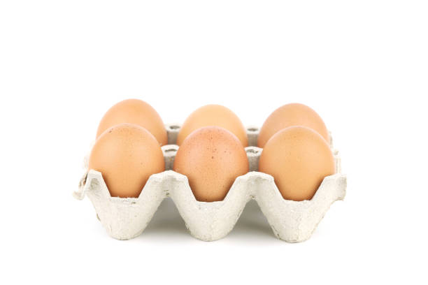 White Isolated eggs in carton tray