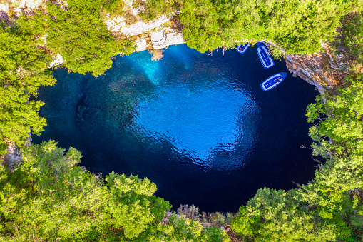 Paklinski, also called Pakleni, islands with all their amazing bays and incredible shades of blue-emerald colors and with many anchored yachts and boats seen from a different perspective and captured with a drone during summer vacation in Croatia.