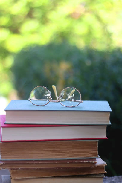 istock Vintage Books and Reading Glasses 1347241170
