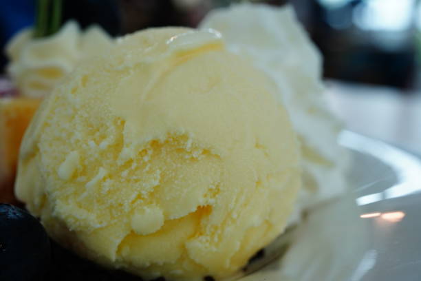 istock Single scoop of light yellow ice cream 1347245364