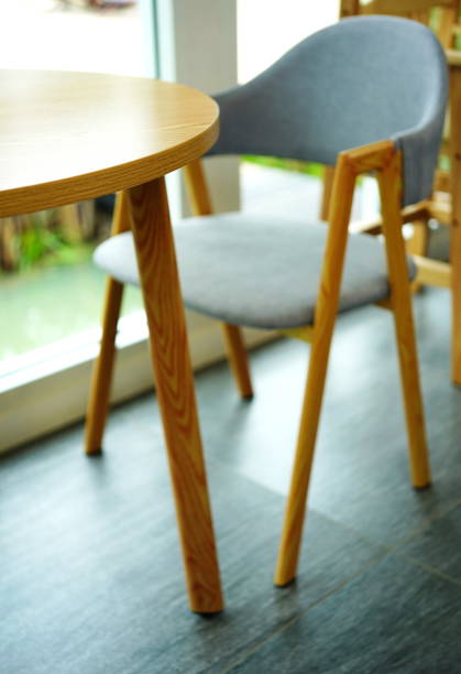istock Close-up Empty Cafe a Wooden Table with Chairs 1347245584