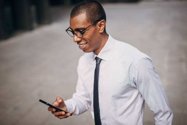 istock Modern businessman in city 1347247230